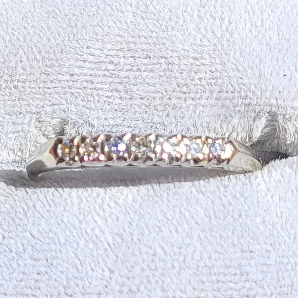 Seven (7) .02 carat Diamonds Set in 14K Gold Band, Size 9.25